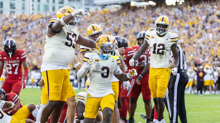 Oct 18, 2025; Tempe, Arizona, USA; Arizona State Sun Devils running back Raleek Brown (3) celebrates with offensive lineman Josh Atkins (53) and wide receiver Malik McClain (12) after scoring a touchdown against the Texas Tech Red Raiders in the fourth quarter at Mountain America Stadium. Mandatory Credit: Mark J. Rebilas-Imagn Images