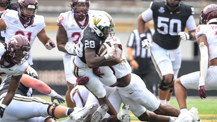 Aug 31, 2024; Nashville, Tennessee, USA; Vanderbilt Commodores running back Sedrick Alexander (28) runs the ball against the Virginia Tech Hokies during the second half at FirstBank Stadium. Mandatory Credit: Steve Roberts-Imagn Images Aug 31, 2024; Nashville, Tennessee, USA; Vanderbilt Commodores running back Sedrick Alexander (28) runs the ball against the Virginia Tech Hokies during the second half at FirstBank Stadium. Mandatory Credit: Steve Roberts-Imagn Images
