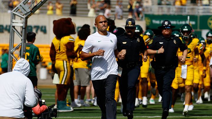 Sep 19, 2026; Waco, Texas, USA; Baylor Bears head coach Dave Aranda runs onto the field with his team before the game against the Louisiana Tech Bulldogs at McLane Stadium. Mandatory Credit: Chris Jones-Imagn Images Sep 19, 2026; Waco, Texas, USA; Baylor Bears head coach Dave Aranda runs onto the field with his team before the game against the Louisiana Tech Bulldogs at McLane Stadium. Mandatory Credit: Chris Jones-Imagn Images
