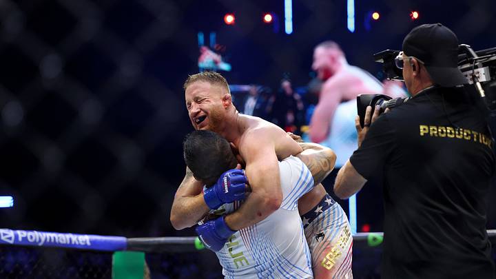 Jun 14, 2026; Washington, D.C., USA; Justin Gaethje (blue gloves) celebrates with his team after winning the UFC Freedom 250 fight against Ilia Topuria (not pictured) at the White House South Lawn. Mandatory Credit: Amber Searls-Imagn Images Jun 14, 2026; Washington, D.C., USA; Justin Gaethje (blue gloves) celebrates with his team after winning the UFC Freedom 250 fight against Ilia Topuria (not pictured) at the White House South Lawn. Mandatory Credit: Amber Searls-Imagn Images