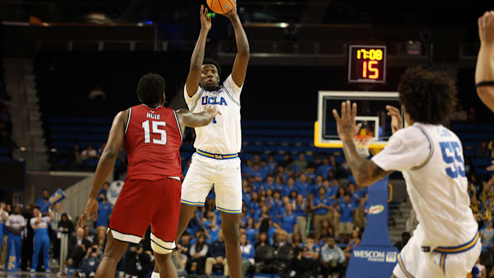 Nov 3, 2025; Los Angeles, California, USA; UCLA Bruins center Xavier Booker (1) passes the ball to guard Skyy Clark (55) during the second half against the Eastern Washington Eagles at Pauley Pavilion presented by Wescom Financial. Mandatory Credit: Kiyoshi Mio-Imagn Images Nov 3, 2025; Los Angeles, California, USA; UCLA Bruins center Xavier Booker (1) passes the ball to guard Skyy Clark (55) during the second half against the Eastern Washington Eagles at Pauley Pavilion presented by Wescom Financial. Mandatory Credit: Kiyoshi Mio-Imagn Images