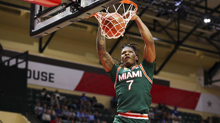 Nov 28, 2025; Kissimmee, FL, USA; Miami (FL) Hurricanes forward Shelton Henderson (7) dunks the ball against the Georgetown Hoyas in the second half during the ESPN Events Invitational at State Farm Field House. Mandatory Credit: Nathan Ray Seebeck-Imagn Images