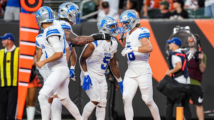 Detroit Lions wide receiver Isaac Teslaa (18) celebrates a touchdown against Cincinnati Bengals with running back David Montgomery (5) during the second half at Paycor Stadium in Cincinnati on Sunday, Oct. 5, 2025.