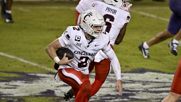 Nov 29, 2025; Fort Worth, Texas, USA; Cincinnati Bearcats quarterback Brendan Sorsby (2) runs with the ball during the second half against the TCU Horned Frogs at Amon G. Carter Stadium. Mandatory Credit: Jerome Miron-Imagn Images