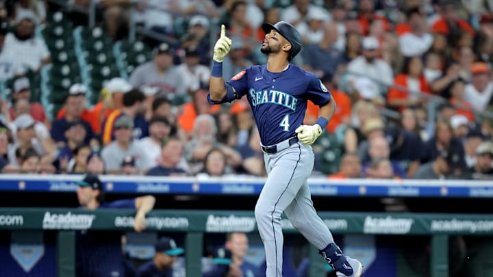 May 23, 2025; Houston, Texas, USA; Seattle Mariners right fielder Leody Taveras (4) reacts after hitting a solo home run to right field against the Houston Astros during the third inning at Daikin Park. Mandatory Credit: Erik Williams-Imagn Images
