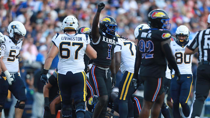Kansas Jayhawks linebacker Bangally Kamara (1) holds his fist up after making a stop against West Virginia Mountaineers during the first half of the game against West Virginia Mountaineers at David Booth Kansas Memorial Stadium on Sept. 20, 2025.