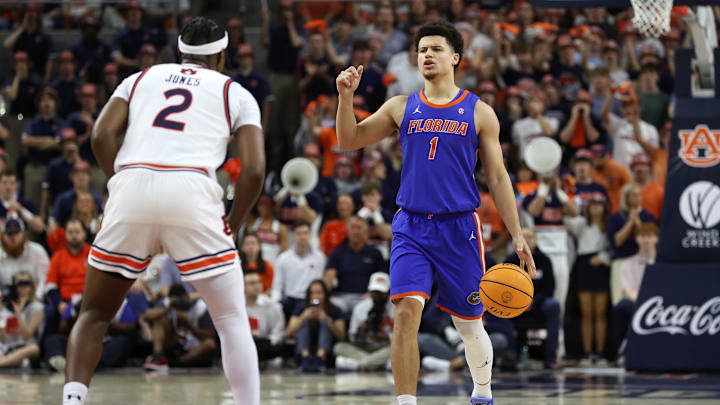 Feb 8, 2025; Auburn, Alabama, USA;  Florida Gators guard Walter Clayton Jr. (1) runs a play against the Auburn Tigers during the first half at Neville Arena. Mandatory Credit: John Reed-Imagn Images