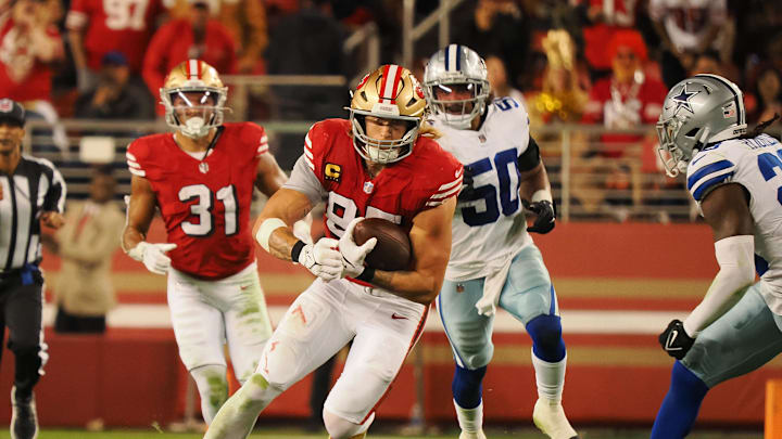 Oct 27, 2024; Santa Clara, California, USA; San Francisco 49ers tight end George Kittle (85) carries the ball against the Dallas Cowboys during the second quarter at Levi's Stadium. Mandatory Credit: Kelley L Cox-Imagn Images Oct 27, 2024; Santa Clara, California, USA; San Francisco 49ers tight end George Kittle (85) carries the ball against the Dallas Cowboys during the second quarter at Levi's Stadium. Mandatory Credit: Kelley L Cox-Imagn Images