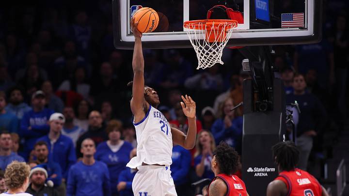 Dec 20, 2025; Atlanta, Georgia, USA; Kentucky Wildcats forward Jayden Quaintance (21) dunks against the St. John Red Storm in the second half at State Farm Arena. Mandatory Credit: Brett Davis-Imagn Images
