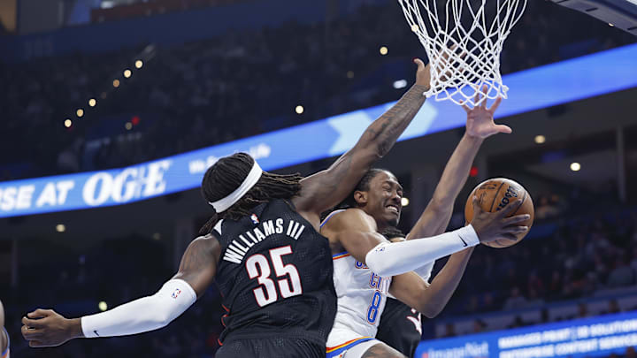 Nov 20, 2024; Oklahoma City, Oklahoma, USA; Oklahoma City Thunder forward Jalen Williams (8) drives to the basket against Portland Trail Blazers center Robert Williams III (35) during the second half at Paycom Center. Mandatory Credit: Alonzo Adams-Imagn Images Nov 20, 2024; Oklahoma City, Oklahoma, USA; Oklahoma City Thunder forward Jalen Williams (8) drives to the basket against Portland Trail Blazers center Robert Williams III (35) during the second half at Paycom Center. Mandatory Credit: Alonzo Adams-Imagn Images