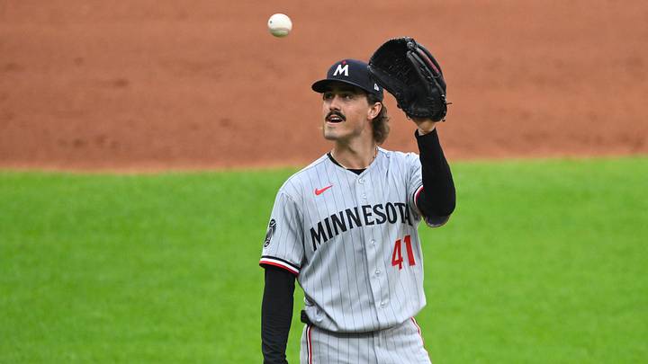 Jul 20, 2026; Cleveland, Ohio, USA; Minnesota Twins starting pitcher Joe Ryan (41) gets a new baseball after giving up a solo home run the Cleveland Guardians designated hitter Rhys Hoskins (not pictured) in the second inning at Progressive Field. Mandatory Credit: David Richard-Imagn Images