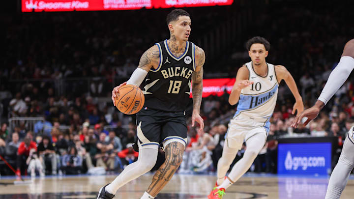 Feb 7, 2025; Atlanta, Georgia, USA; Milwaukee Bucks forward Kyle Kuzma (18) dribbles against the Atlanta Hawks in the second quarter at State Farm Arena. Mandatory Credit: Brett Davis-Imagn Images