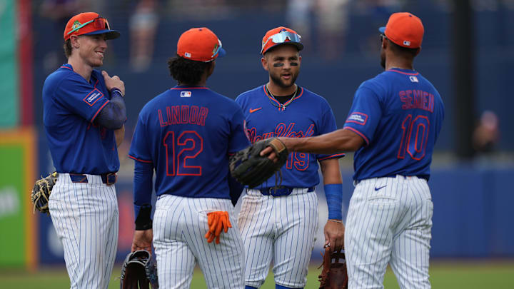 Mar 15, 2026; Port St. Lucie, Florida, USA;  (l to rt) New York Mets third baseman Brett Baty (7), shortstop Francisco Lindor (12), shortstop Bo Bichette (19) and second baseman Marcus Semien (10) gather during a pitching change in the fourth inning against the Toronto Blue Jays at Clover Park. Mandatory Credit: Jim Rassol-Imagn Images