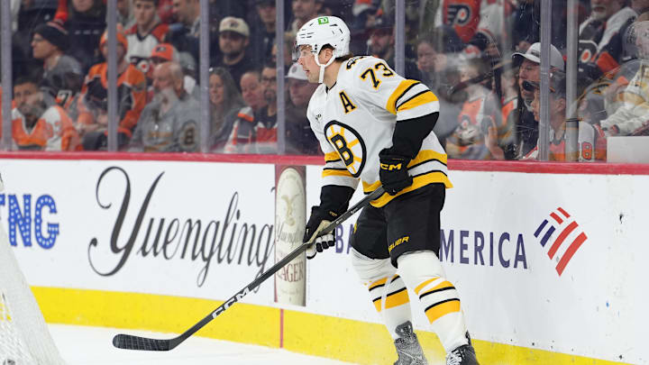 Apr 5, 2026; Philadelphia, Pennsylvania, USA; Boston Bruins defenseman Charlie McAvoy (73) controls the puck against the Philadelphia Flyers in the first period at Xfinity Mobile Arena. Mandatory Credit: Kyle Ross-Imagn Images