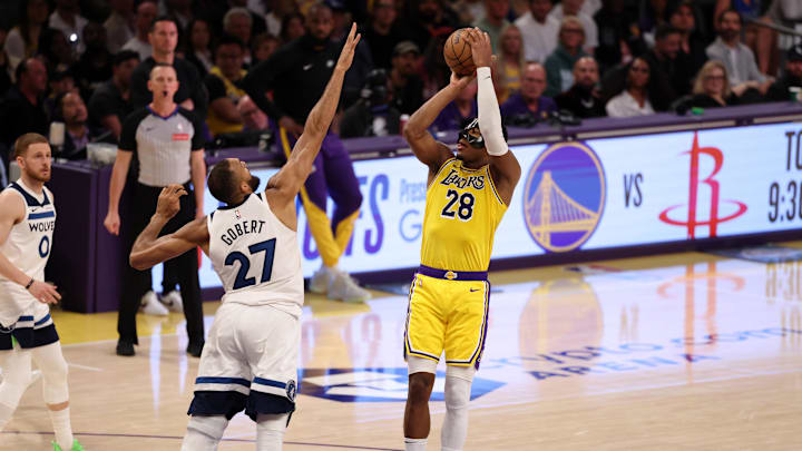 Apr 22, 2025; Los Angeles, California, USA; Los Angeles Lakers forward Rui Hachimura (28) shoots the ball over Minnesota Timberwolves center Rudy Gobert (27) during the third quarter of game two of first round for the 2024 NBA Playoffs at Crypto.com Arena. Mandatory Credit: Kiyoshi Mio-Imagn Images Apr 22, 2025; Los Angeles, California, USA; Los Angeles Lakers forward Rui Hachimura (28) shoots the ball over Minnesota Timberwolves center Rudy Gobert (27) during the third quarter of game two of first round for the 2024 NBA Playoffs at Crypto.com Arena. Mandatory Credit: Kiyoshi Mio-Imagn Images