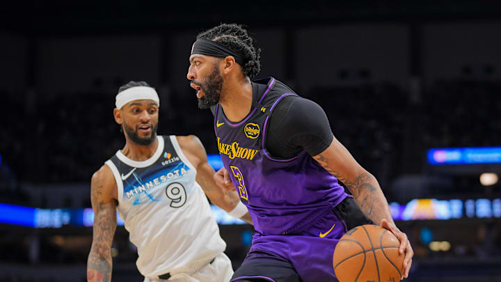Dec 2, 2024; Minneapolis, Minnesota, USA; Los Angeles Lakers forward Anthony Davis (3) dribbles against the Minnesota Timberwolves in the second quarter at Target Center. Mandatory Credit: Brad Rempel-Imagn Images