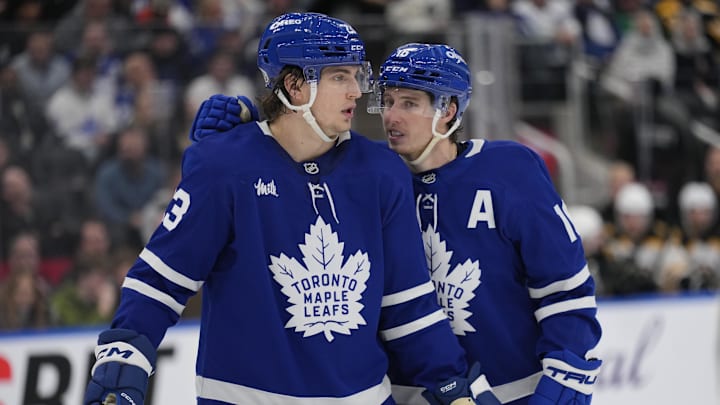 Jan 4, 2025; Toronto, Ontario, CAN; Toronto Maple Leafs forward Mitch Marner (16) talks to forward Matthew Knies (23) during a break in the action against the Boston Bruins during the third period at Scotiabank Arena. Mandatory Credit: John E. Sokolowski-Imagn Images Jan 4, 2025; Toronto, Ontario, CAN; Toronto Maple Leafs forward Mitch Marner (16) talks to forward Matthew Knies (23) during a break in the action against the Boston Bruins during the third period at Scotiabank Arena. Mandatory Credit: John E. Sokolowski-Imagn Images