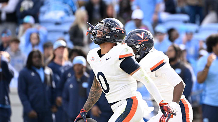 Oct 25, 2025; Chapel Hill, North Carolina, USA; Virginia Cavaliers safety Antonio Clary (0) celebrates after intercepting a pass near the end of the fourth quarter at Kenan Stadium. Mandatory Credit: Bob Donnan-Imagn Images