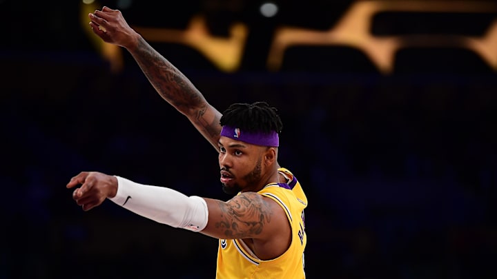 Mar 1, 2022; Los Angeles, California, USA; Los Angeles Lakers forward Kent Bazemore (9) reacts against the Dallas Mavericks during the second half at Crypto.com Arena. Mandatory Credit: Gary A. Vasquez-Imagn Images Mar 1, 2022; Los Angeles, California, USA; Los Angeles Lakers forward Kent Bazemore (9) reacts against the Dallas Mavericks during the second half at Crypto.com Arena. Mandatory Credit: Gary A. Vasquez-Imagn Images