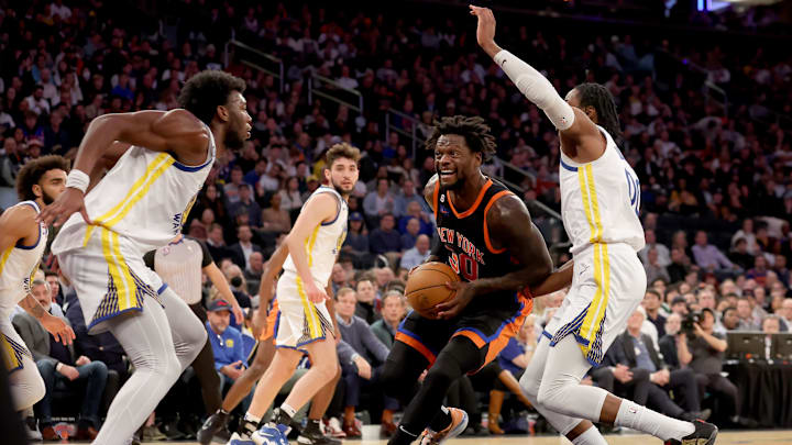 Dec 20, 2022; New York, New York, USA; New York Knicks forward Julius Randle (30) drives to the basket against Golden State Warriors center James Wiseman (33) and forward Jonathan Kuminga (00) during the third quarter at Madison Square Garden. Mandatory Credit: Brad Penner-Imagn Images Dec 20, 2022; New York, New York, USA; New York Knicks forward Julius Randle (30) drives to the basket against Golden State Warriors center James Wiseman (33) and forward Jonathan Kuminga (00) during the third quarter at Madison Square Garden. Mandatory Credit: Brad Penner-Imagn Images