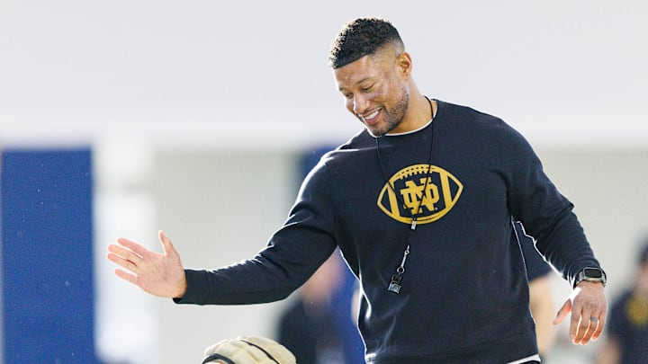 Notre Dame head coach Marcus Freeman greets his players during a Notre Dame football spring practice at Irish Athletic Center on Wednesday, March 19, 2025, in South Bend.