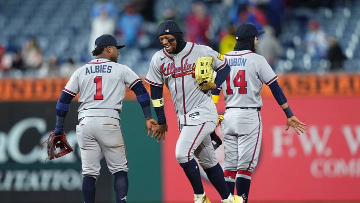 Apr 19, 2026; Philadelphia, Pennsylvania, USA; Atlanta Braves outfielder Ronald Acuna Jr. (13) reacts with infielder Ozzie Albies (1) after the game against the Philadelphia Phillies at Citizens Bank Park. Mandatory Credit: Kyle Ross-Imagn Images