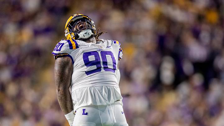 Sep 20, 2025; Baton Rouge, Louisiana, USA; LSU Tigers defensive tackle Jacobian Guillory II (90) reacts to causing a fumble against the Southeastern Louisiana Lions during the first half at Tiger Stadium. Mandatory Credit: Stephen Lew-Imagn Images Sep 20, 2025; Baton Rouge, Louisiana, USA; LSU Tigers defensive tackle Jacobian Guillory II (90) reacts to causing a fumble against the Southeastern Louisiana Lions during the first half at Tiger Stadium. Mandatory Credit: Stephen Lew-Imagn Images