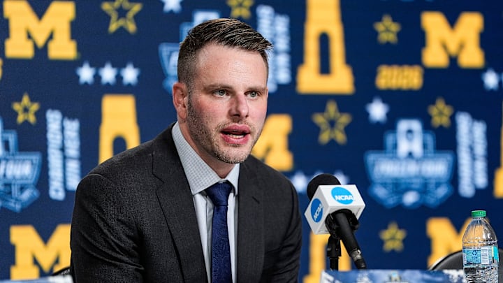 Michigan head coach Brandon Naurato answer questions at the post game press conference after 4-3 loss to Denver in the two overtimes at the Frozen Four semifinal at T-Mobile Arena in Las Vegas on Thursday, April 9, 2026