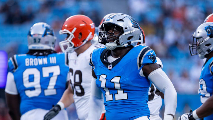 Aug 8, 2025; Charlotte, North Carolina, USA; Carolina Panthers linebacker Nic Scourton (11) celebrates during the second quarter against the Cleveland Browns at Bank of America Stadium. Mandatory Credit: Scott Kinser-The USAToday Network via Imagn Images 