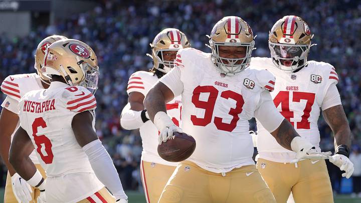 Oct 11, 2026; Seattle, Washington, USA; San Francisco 49ers defensive tackle Gracen Halton (93) celebrates with safety Malik Mustapha (6) and defensive end Khalid Kareem (47) after recovering a fumble in the end zone for a touchdown against Seattle Seahawks running back George Holani (not pictured) during the first half at Lumen Field. Mandatory Credit: Joe Nicholson-Imagn Images Oct 11, 2026; Seattle, Washington, USA; San Francisco 49ers defensive tackle Gracen Halton (93) celebrates with safety Malik Mustapha (6) and defensive end Khalid Kareem (47) after recovering a fumble in the end zone for a touchdown against Seattle Seahawks running back George Holani (not pictured) during the first half at Lumen Field. Mandatory Credit: Joe Nicholson-Imagn Images