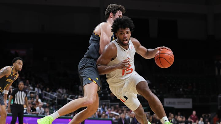 Mar 6, 2024; Coral Gables, Florida, USA; Miami Hurricanes forward Norchad Omier (15) drives to the