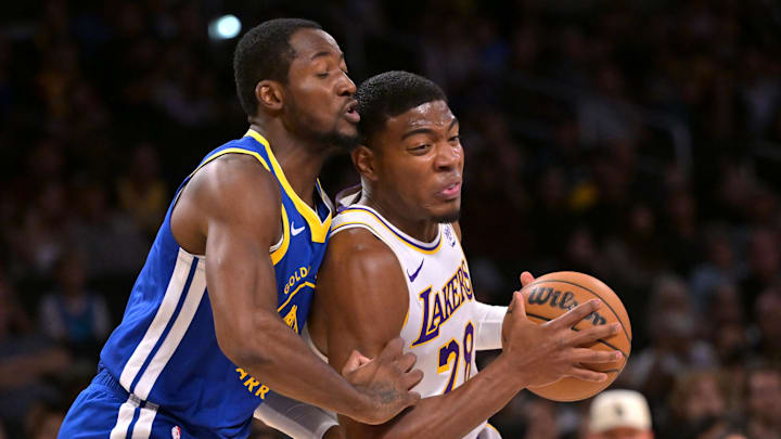 Oct 12, 2025; Los Angeles, California, USA;  Los Angeles Lakers forward Rui Hachimura (28) is defended by Golden State Warriors guard Taevion Kinsey (1) in the first half at Crypto.com Arena. Mandatory Credit: Jayne Kamin-Oncea-Imagn Images