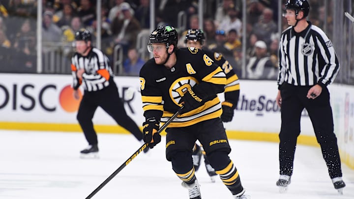 Apr 26, 2026; Boston, Massachusetts, USA; Boston Bruins right wing David Pastrnak (88) controls the puck during the first period in game four of the first round of the 2026 Stanley Cup Playoffs against the Buffalo Sabres at TD Garden. Mandatory Credit: Bob DeChiara-Imagn Images