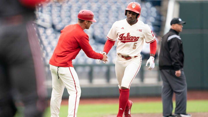 Indiana outfielder Devin Taylor rounds the bases after he hit a two-run home run at Charles Schwab Field in Omaha, Neb. in Indiana's 5-2 loss to Rutgers on May 20, 2025.