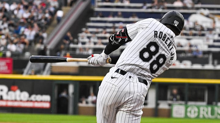 Jun 7, 2024; Chicago, Illinois, USA;  Chicago White Sox outfielder Luis Robert Jr. (88) hits a home run against the Boston Red Sox during the first inning at Guaranteed Rate Field. Mandatory Credit: Matt Marton-USA TODAY Sports