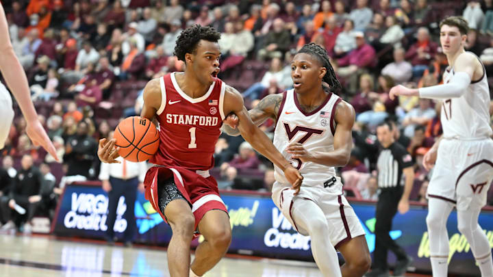 Jan 7, 2026; Blacksburg, Va.; Stanford guard Ebuka Okorie (1) drives with the ball as Virginia Tech guard Ben Hammond (3) defends.