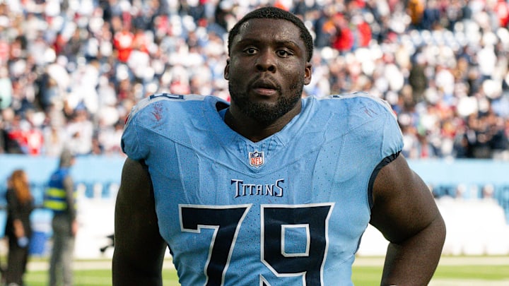 Oct 19, 2025; Nashville, Tennessee, USA; Tennessee Titans center Lloyd Cushenberry III (79) walks off the field post game against the New England Patriots at Nissan Stadium. Mandatory Credit: Steve Roberts-Imagn Images Oct 19, 2025; Nashville, Tennessee, USA; Tennessee Titans center Lloyd Cushenberry III (79) walks off the field post game against the New England Patriots at Nissan Stadium. Mandatory Credit: Steve Roberts-Imagn Images