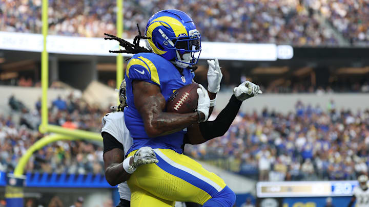 Nov 2, 2025; Inglewood, California, USA; Los Angeles Rams wide receiver Davante Adams (17) makes a touchdown catch in front of New Orleans Saints cornerback Kool-Aid McKinstry (4) during the second half at SoFi Stadium. Mandatory Credit: Kiyoshi Mio-Imagn Images