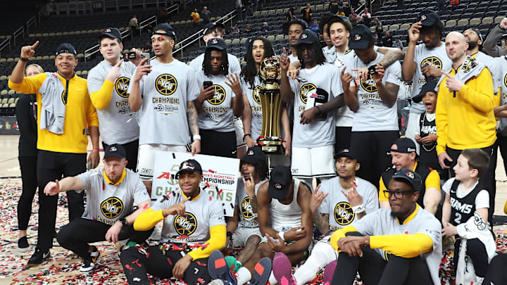 The VCU Rams celebrate after winning the Atlantic 10 conference championship and earning an automatic bid into the men’s NCAA tournament.