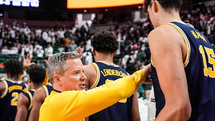 Michigan head coach Dusty May congratulate players after 83-71 win over Michigan State at Breslin Center in East Lansing on Friday, Jan. 30, 2026.