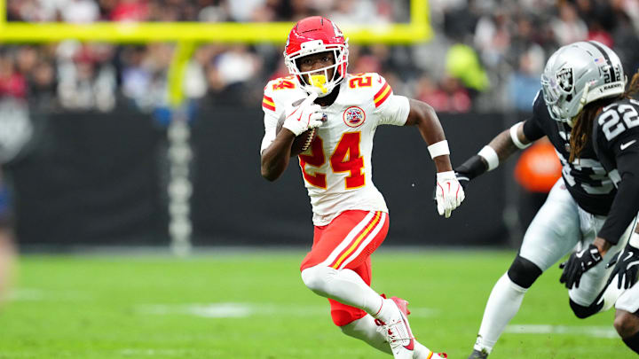 Jan 4, 2026; Paradise, Nevada, USA; Kansas City Chiefs running back Brashard Smith (24) gains yardage against the Las Vegas Raiders during the first quarter at Allegiant Stadium. Mandatory Credit: Stephen R. Sylvanie-Imagn Images