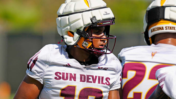 ASU linebacker Martell Hughes (18) warms up during practice in Tempe on July 31, 2024. ASU linebacker Martell Hughes (18) warms up during practice in Tempe on July 31, 2024.