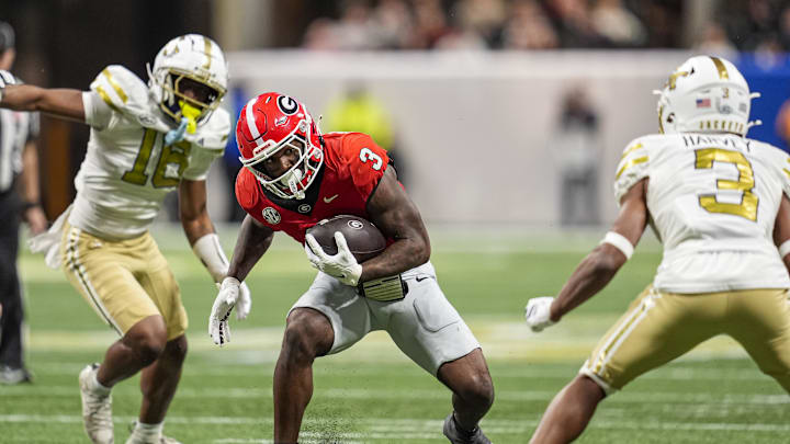 Nov 28, 2025; Atlanta, Georgia, USA; Georgia Bulldogs running back Nate Frazier (3) runs against Georgia Tech Yellow Jackets defensive back Ahmari Harvey (3) during the first half at Mercedes-Benz Stadium. Mandatory Credit: Dale Zanine-Imagn Images Nov 28, 2025; Atlanta, Georgia, USA; Georgia Bulldogs running back Nate Frazier (3) runs against Georgia Tech Yellow Jackets defensive back Ahmari Harvey (3) during the first half at Mercedes-Benz Stadium. Mandatory Credit: Dale Zanine-Imagn Images