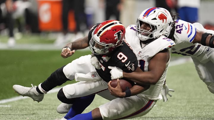 Oct 13, 2025; Atlanta, Georgia, USA; Buffalo Bills defensive tackle Ed Oliver (91) sacks Atlanta Falcons quarterback Michael Penix Jr. (9) during an NFL game at Mercedes-Benz Stadium. Oct 13, 2025; Atlanta, Georgia, USA; Buffalo Bills defensive tackle Ed Oliver (91) sacks Atlanta Falcons quarterback Michael Penix Jr. (9) during an NFL game at Mercedes-Benz Stadium.