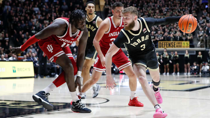 Purdue Boilermakers guard Braden Smith (3) drives past Indiana Hoosiers center Oumar Ballo (11) 