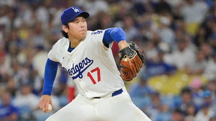 Sep 16, 2025; Los Angeles, California, USA; Los Angeles Dodgers two-way player Shohei Ohtani (17) delivers a pitch during the third inning against the Philadelphia Phillies at Dodger Stadium. Mandatory Credit: Jayne Kamin-Oncea-Imagn Images