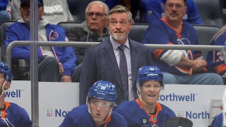 Oct 21, 2025; Elmont, New York, USA; New York Islanders head coach Patrick Roy coaches against the San Jose Sharks during the first period at UBS Arena. Mandatory Credit: Brad Penner-Imagn Images