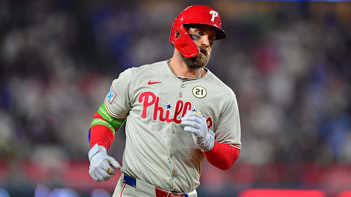 Sep 15, 2025; Los Angeles, California, USA; Philadelphia Phillies first baseman Bryce Harper (3) runs the bases after hitting a solo home run against the Los Angeles Dodgers during the eighth inning at Dodger Stadium. 