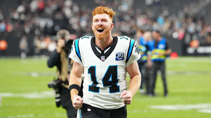 Sep 22, 2024; Paradise, Nevada, USA; Carolina Panthers quarterback Andy Dalton (14) celebrates after the Panthers defeated the Las Vegas Raiders at Allegiant Stadium. Mandatory Credit: Stephen R. Sylvanie-Imagn Images
