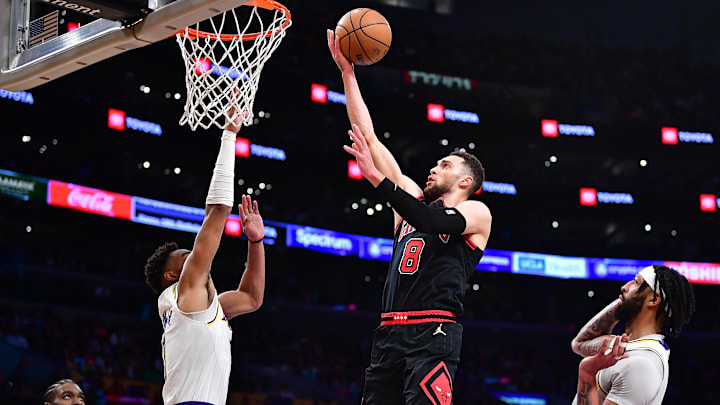Mar 26, 2023; Los Angeles, California, USA; Chicago Bulls guard Zach LaVine (8) moves to the basket against Los Angeles Lakers forward Troy Brown Jr. (7) and forward Anthony Davis (3) during the second half at Crypto.com Arena. Mandatory Credit: Gary A. Vasquez-Imagn Images Mar 26, 2023; Los Angeles, California, USA; Chicago Bulls guard Zach LaVine (8) moves to the basket against Los Angeles Lakers forward Troy Brown Jr. (7) and forward Anthony Davis (3) during the second half at Crypto.com Arena. Mandatory Credit: Gary A. Vasquez-Imagn Images